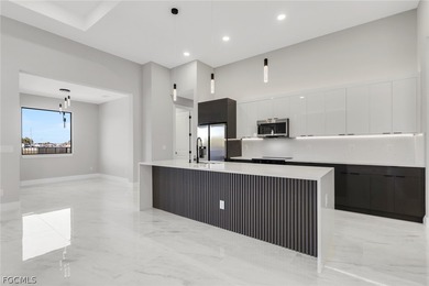 Welcome to your new construction masterpiece on a freshwater on Burnt Store Golf Club in Florida - for sale on GolfHomes.com, golf home, golf lot