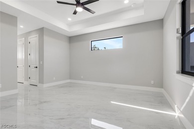 Welcome to your new construction masterpiece on a freshwater on Burnt Store Golf Club in Florida - for sale on GolfHomes.com, golf home, golf lot