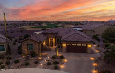 This STUNNING home located within Sun City Anthem at Merrill on Poston Butte Golf Club in Arizona - for sale on GolfHomes.com, golf home, golf lot