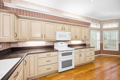 Enjoy a Relaxing Lifestyle in the desirable Gated, Golf on East Lake Woodlands Country Club in Florida - for sale on GolfHomes.com, golf home, golf lot