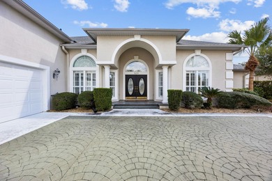 Live The Florida Lifestyle With Stunning Golf And Lake Views In on Marsh Creek Country Club in Florida - for sale on GolfHomes.com, golf home, golf lot