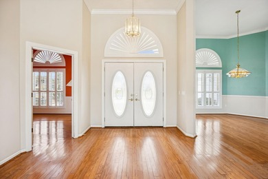 Live The Florida Lifestyle With Stunning Golf And Lake Views In on Marsh Creek Country Club in Florida - for sale on GolfHomes.com, golf home, golf lot