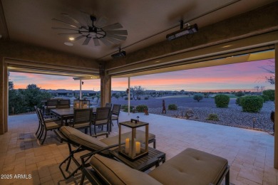 This STUNNING home located within Sun City Anthem at Merrill on Poston Butte Golf Club in Arizona - for sale on GolfHomes.com, golf home, golf lot