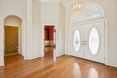 Live The Florida Lifestyle With Stunning Golf And Lake Views In on Marsh Creek Country Club in Florida - for sale on GolfHomes.com, golf home, golf lot