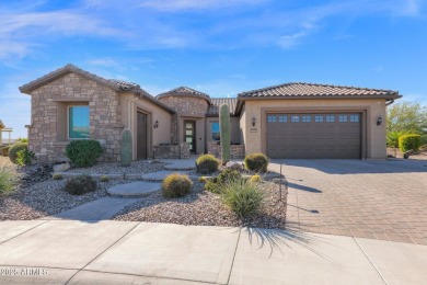 This STUNNING home located within Sun City Anthem at Merrill on Poston Butte Golf Club in Arizona - for sale on GolfHomes.com, golf home, golf lot