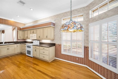 Enjoy a Relaxing Lifestyle in the desirable Gated, Golf on East Lake Woodlands Country Club in Florida - for sale on GolfHomes.com, golf home, golf lot