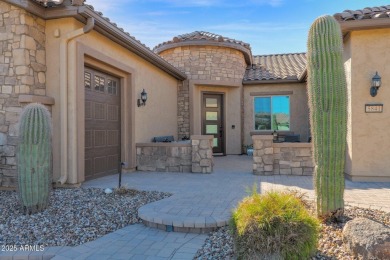 This STUNNING home located within Sun City Anthem at Merrill on Poston Butte Golf Club in Arizona - for sale on GolfHomes.com, golf home, golf lot