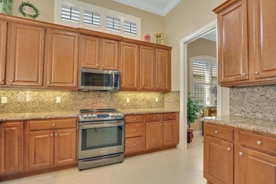 Welcome to this stunning 4-bedroom, 3.5-bathroom home located in on The Legacy Golf and Tennis Club in Florida - for sale on GolfHomes.com, golf home, golf lot