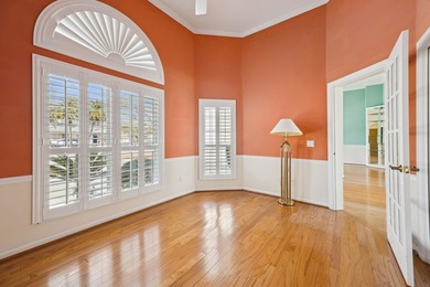 Live The Florida Lifestyle With Stunning Golf And Lake Views In on Marsh Creek Country Club in Florida - for sale on GolfHomes.com, golf home, golf lot