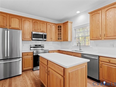 Welcome home to this beautiful 4-bedroom, 2.5-bath transitional on Highlands Golfers Club in Virginia - for sale on GolfHomes.com, golf home, golf lot