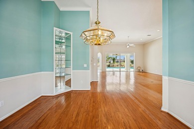 Live The Florida Lifestyle With Stunning Golf And Lake Views In on Marsh Creek Country Club in Florida - for sale on GolfHomes.com, golf home, golf lot