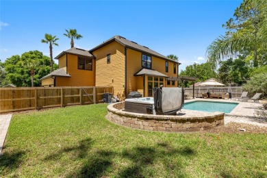 Welcome to one of the nicest pool homes in the gated golf course on Turkey Creek Golf and Country Club in Florida - for sale on GolfHomes.com, golf home, golf lot