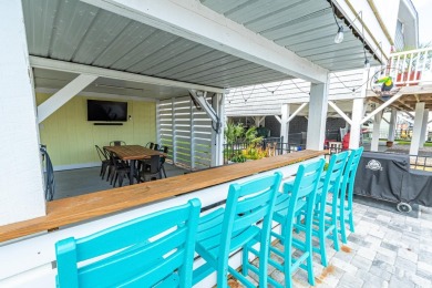 Welcome to Paradise Palms, a beautifully elevated channel-front on Beachwood Golf Club in South Carolina - for sale on GolfHomes.com, golf home, golf lot