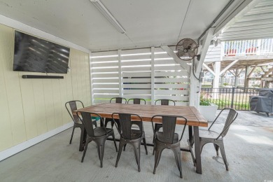Welcome to Paradise Palms, a beautifully elevated channel-front on Beachwood Golf Club in South Carolina - for sale on GolfHomes.com, golf home, golf lot
