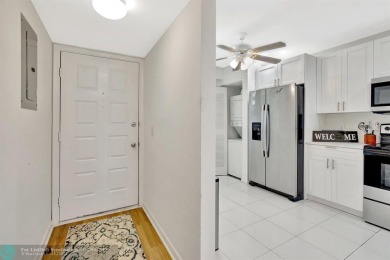 This  2 bd /1.5 bath features laminated floors throughout on Flamingo Lakes Country Club in Florida - for sale on GolfHomes.com, golf home, golf lot