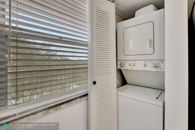 This  2 bd /1.5 bath features laminated floors throughout on Flamingo Lakes Country Club in Florida - for sale on GolfHomes.com, golf home, golf lot
