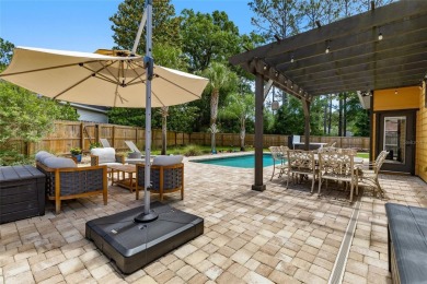 Welcome to one of the nicest pool homes in the gated golf course on Turkey Creek Golf and Country Club in Florida - for sale on GolfHomes.com, golf home, golf lot