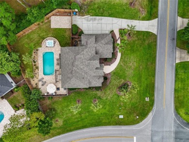 Welcome to one of the nicest pool homes in the gated golf course on Turkey Creek Golf and Country Club in Florida - for sale on GolfHomes.com, golf home, golf lot