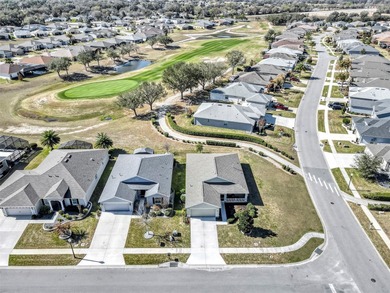 Welcome to a life that feels like vacation every day. Nestled in on Arlington Ridge Golf Club in Florida - for sale on GolfHomes.com, golf home, golf lot
