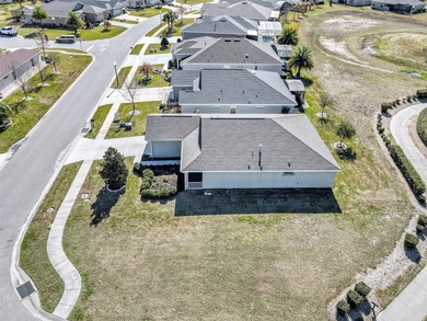 Welcome to a life that feels like vacation every day. Nestled in on Arlington Ridge Golf Club in Florida - for sale on GolfHomes.com, golf home, golf lot