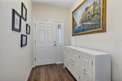 Welcome to a life that feels like vacation every day. Nestled in on Arlington Ridge Golf Club in Florida - for sale on GolfHomes.com, golf home, golf lot