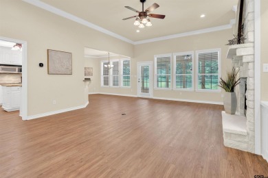Welcome to your dream home in the charming Hideaway community! on Hide-A-Way Lake Golf Course in Texas - for sale on GolfHomes.com, golf home, golf lot
