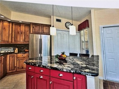 Welcome to this beautifully reimagined first-floor residence in on Spring Run Golf Club in Florida - for sale on GolfHomes.com, golf home, golf lot