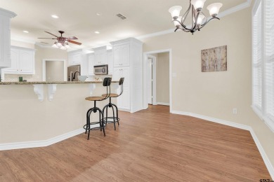 Welcome to your dream home in the charming Hideaway community! on Hide-A-Way Lake Golf Course in Texas - for sale on GolfHomes.com, golf home, golf lot