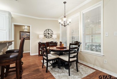 Welcome to your dream home in the charming Hideaway community! on Hide-A-Way Lake Golf Course in Texas - for sale on GolfHomes.com, golf home, golf lot