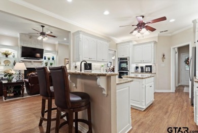 Welcome to your dream home in the charming Hideaway community! on Hide-A-Way Lake Golf Course in Texas - for sale on GolfHomes.com, golf home, golf lot