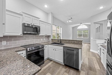 Don't miss your chance to own a 5 bedroom 3.5 bath in the HIGHLY on Champions Club at Summerfield in Florida - for sale on GolfHomes.com, golf home, golf lot