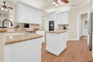 Welcome to your dream home in the charming Hideaway community! on Hide-A-Way Lake Golf Course in Texas - for sale on GolfHomes.com, golf home, golf lot