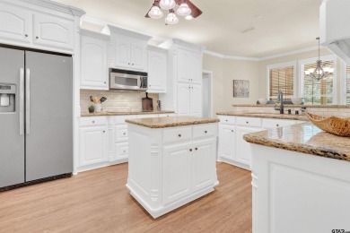 Welcome to your dream home in the charming Hideaway community! on Hide-A-Way Lake Golf Course in Texas - for sale on GolfHomes.com, golf home, golf lot