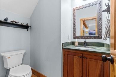 Located in Sapphire Valley, this 3-bedroom, 2.5-bathroom cabin on Sapphire National Golf Club in North Carolina - for sale on GolfHomes.com, golf home, golf lot