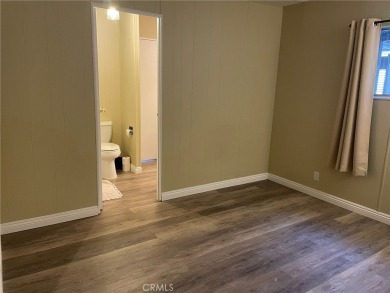 Discover the Perfect Getaway at Canyon Lake Mobile Estates on Canyon Lake Country Club in California - for sale on GolfHomes.com, golf home, golf lot