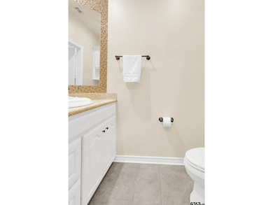 Welcome to your dream home in the charming Hideaway community! on Hide-A-Way Lake Golf Course in Texas - for sale on GolfHomes.com, golf home, golf lot