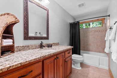 Located in Sapphire Valley, this 3-bedroom, 2.5-bathroom cabin on Sapphire National Golf Club in North Carolina - for sale on GolfHomes.com, golf home, golf lot