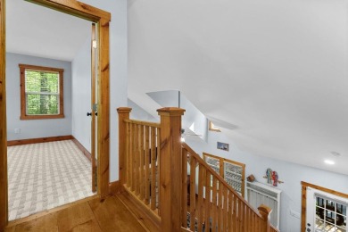 Located in Sapphire Valley, this 3-bedroom, 2.5-bathroom cabin on Sapphire National Golf Club in North Carolina - for sale on GolfHomes.com, golf home, golf lot