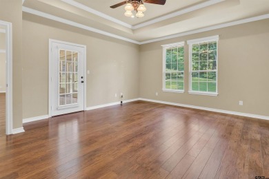 Welcome to your dream home in the charming Hideaway community! on Hide-A-Way Lake Golf Course in Texas - for sale on GolfHomes.com, golf home, golf lot