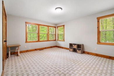 Located in Sapphire Valley, this 3-bedroom, 2.5-bathroom cabin on Sapphire National Golf Club in North Carolina - for sale on GolfHomes.com, golf home, golf lot