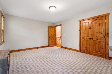 Located in Sapphire Valley, this 3-bedroom, 2.5-bathroom cabin on Sapphire National Golf Club in North Carolina - for sale on GolfHomes.com, golf home, golf lot