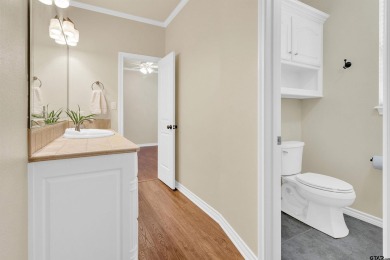 Welcome to your dream home in the charming Hideaway community! on Hide-A-Way Lake Golf Course in Texas - for sale on GolfHomes.com, golf home, golf lot