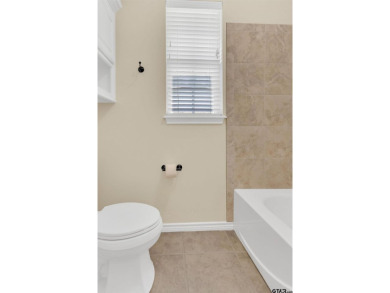 Welcome to your dream home in the charming Hideaway community! on Hide-A-Way Lake Golf Course in Texas - for sale on GolfHomes.com, golf home, golf lot