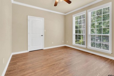 Welcome to your dream home in the charming Hideaway community! on Hide-A-Way Lake Golf Course in Texas - for sale on GolfHomes.com, golf home, golf lot