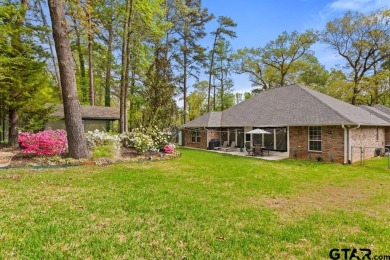 Welcome to your dream home in the charming Hideaway community! on Hide-A-Way Lake Golf Course in Texas - for sale on GolfHomes.com, golf home, golf lot