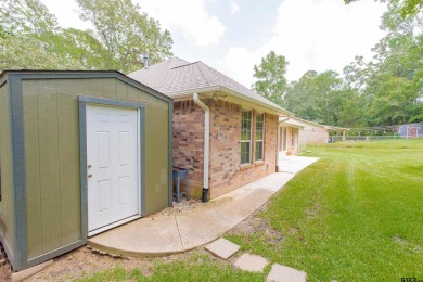 Welcome to your dream home in the charming Hideaway community! on Hide-A-Way Lake Golf Course in Texas - for sale on GolfHomes.com, golf home, golf lot
