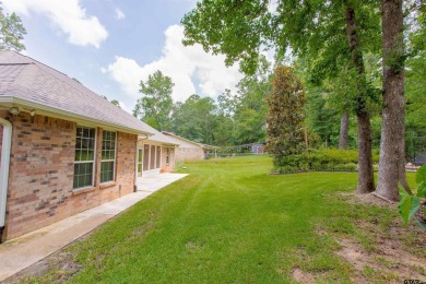 Welcome to your dream home in the charming Hideaway community! on Hide-A-Way Lake Golf Course in Texas - for sale on GolfHomes.com, golf home, golf lot