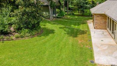 Welcome to your dream home in the charming Hideaway community! on Hide-A-Way Lake Golf Course in Texas - for sale on GolfHomes.com, golf home, golf lot