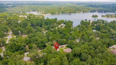 Welcome to your dream home in the charming Hideaway community! on Hide-A-Way Lake Golf Course in Texas - for sale on GolfHomes.com, golf home, golf lot