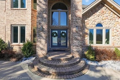 Welcome to this stunning, renovated golf course estate located on Prestwick Village Golf Club in Michigan - for sale on GolfHomes.com, golf home, golf lot